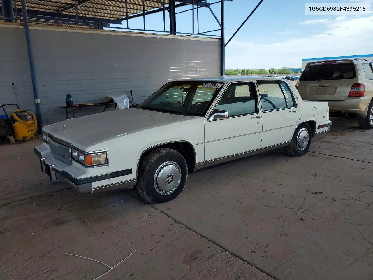 1985 Cadi Deville VIN: 1G6CD6982F4395218 Lot: 61243606