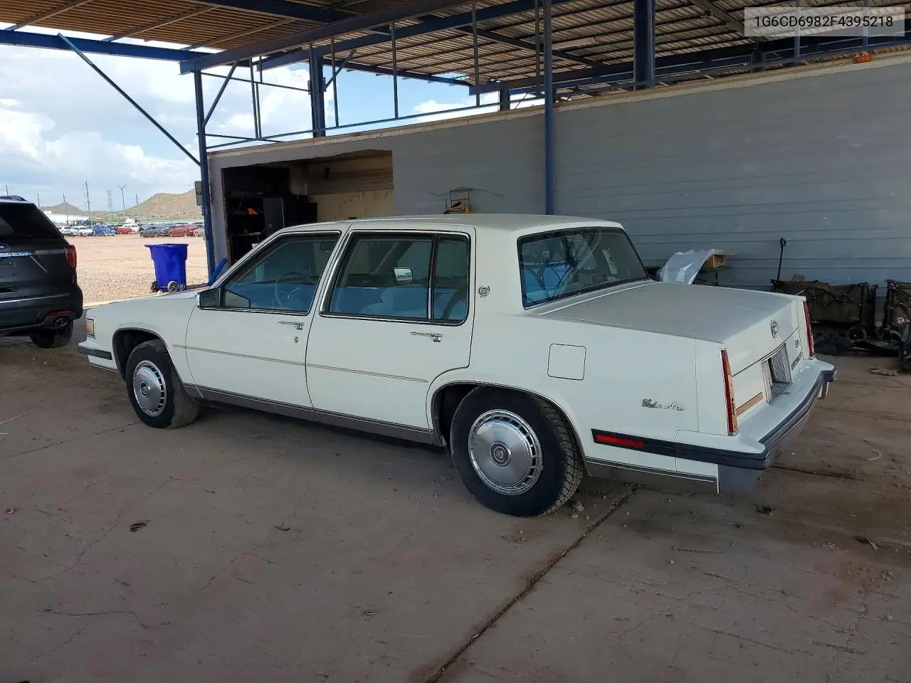 1985 Cadi Deville VIN: 1G6CD6982F4395218 Lot: 61243606