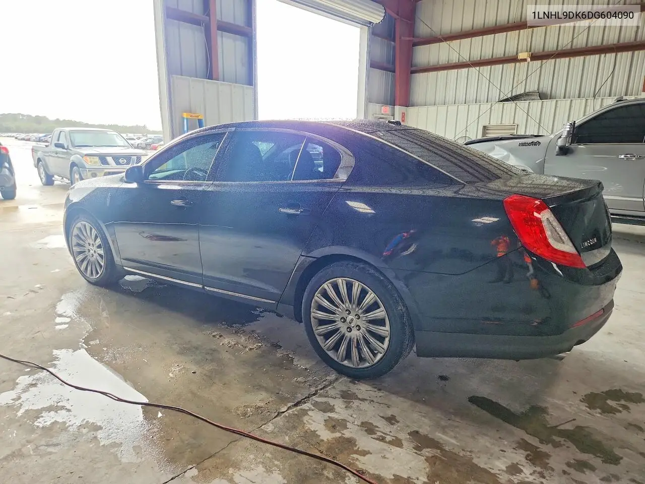 2013 Lincoln Townhouse Mks VIN: 1LNHL9DK6DG604090 Lot: 54350276
