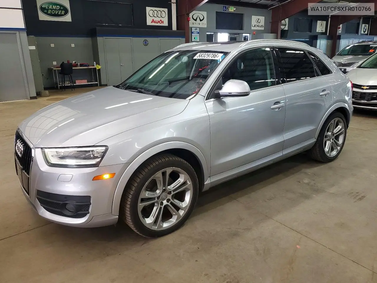 2015 Audi Q3 Prestige VIN: WA1GFCFSXFR010766 Lot: 58329786