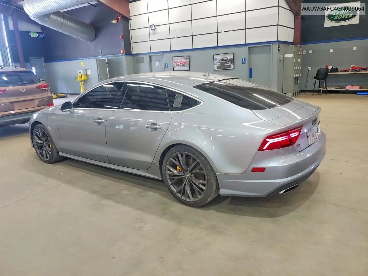 2016 Audi A7 VIN: WAUWGAFC4GN009064 Lot: 57993146