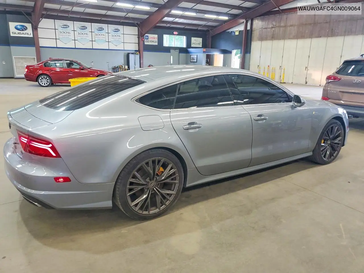 2016 Audi A7 VIN: WAUWGAFC4GN009064 Lot: 57993146
