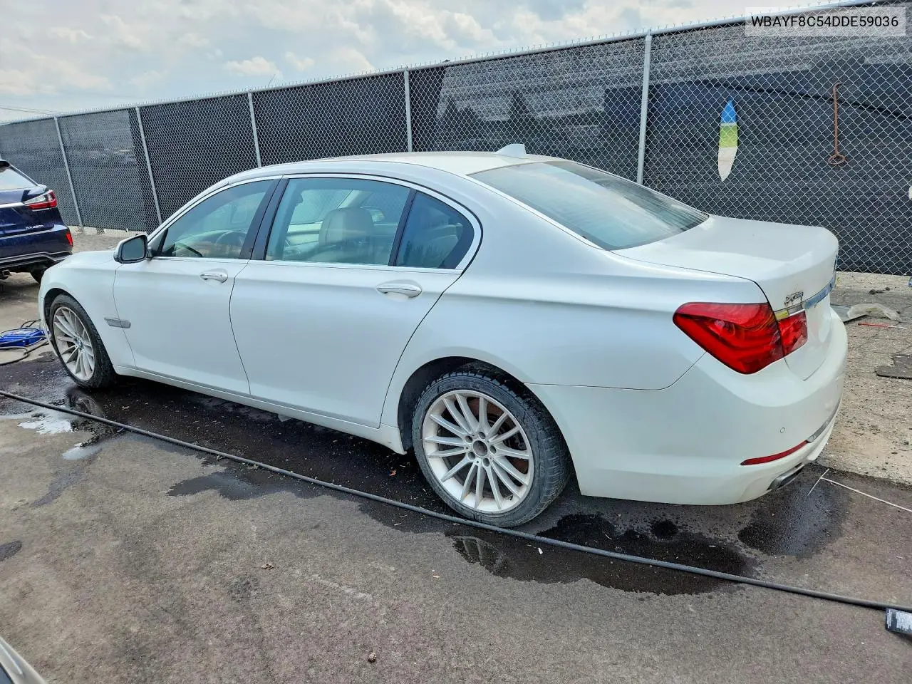 2013 BMW 750 Lxi VIN: WBAYF8C54DDE59036 Lot: 61945696
