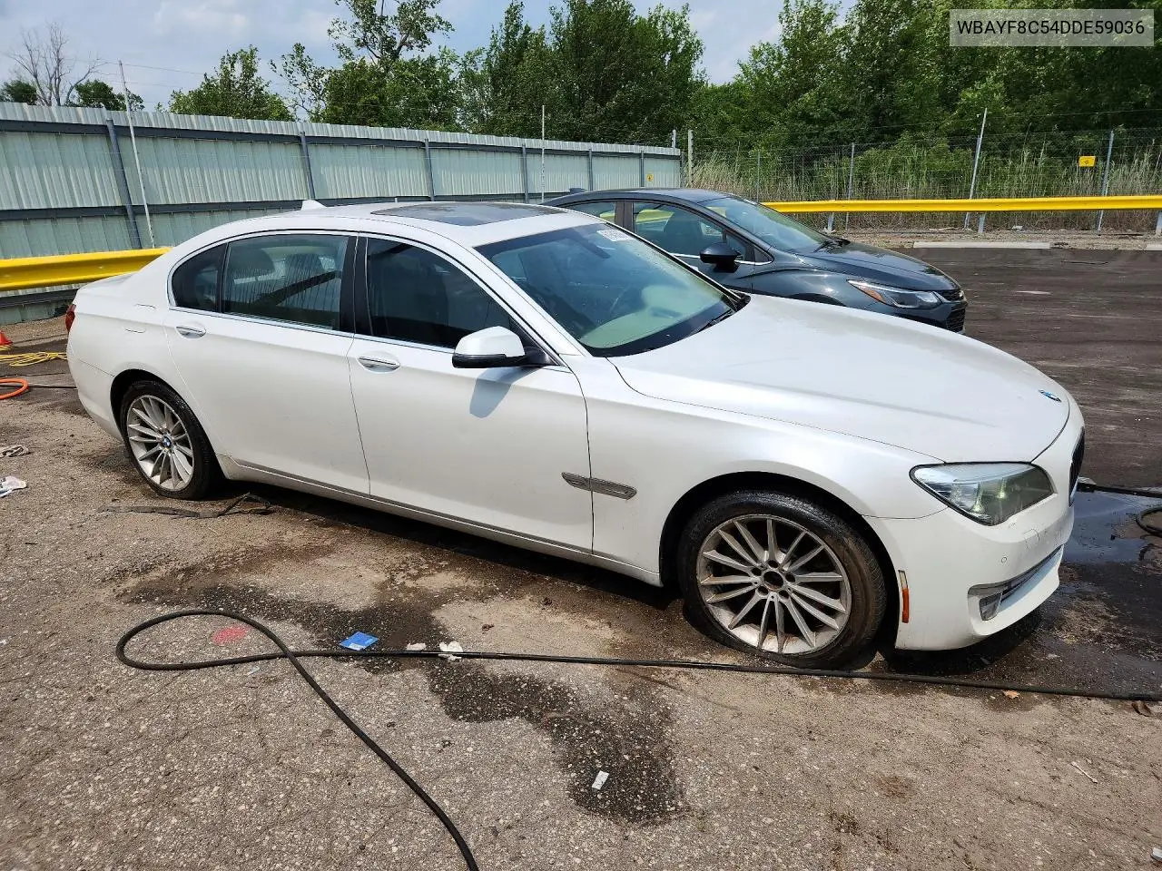 2013 BMW 750 Lxi VIN: WBAYF8C54DDE59036 Lot: 61945696