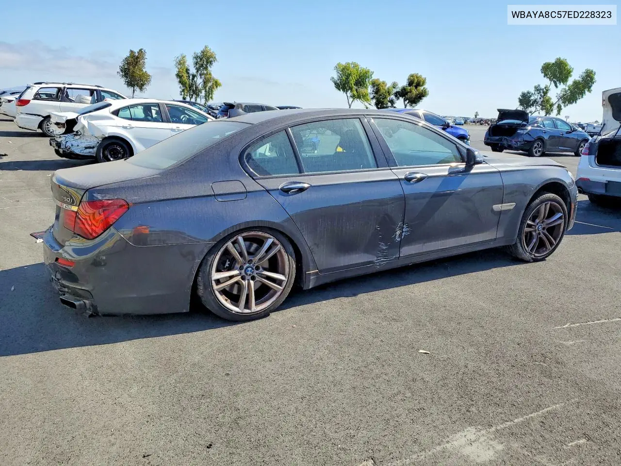 2014 BMW 750 I VIN: WBAYA8C57ED228323 Lot: 56702316