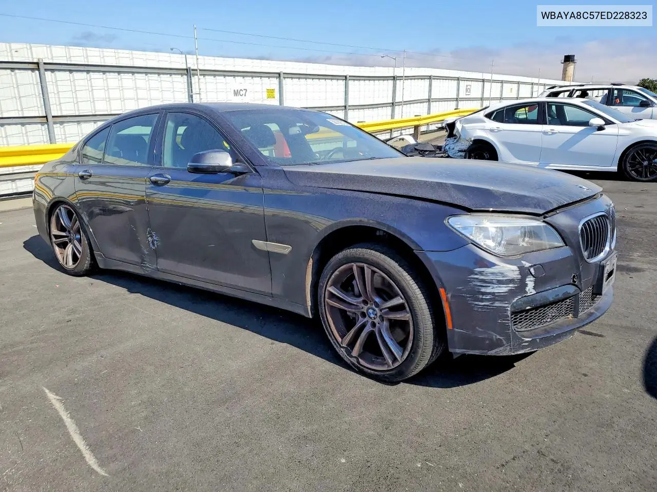 2014 BMW 750 I VIN: WBAYA8C57ED228323 Lot: 56702316
