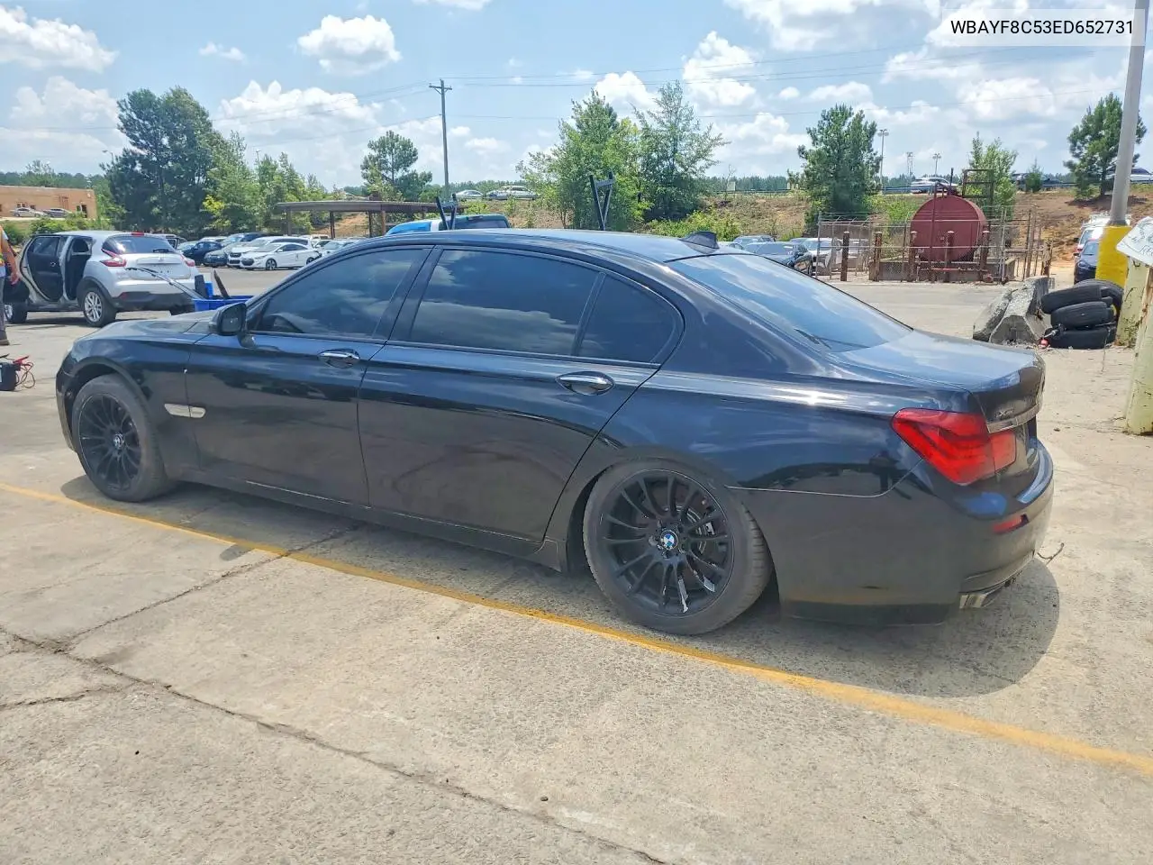 2014 BMW 750 Lxi VIN: WBAYF8C53ED652731 Lot: 57179476