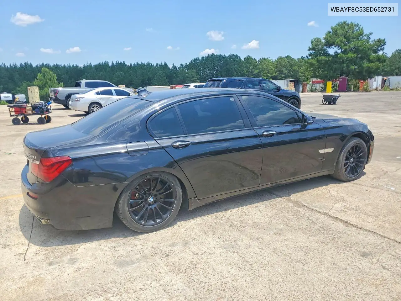2014 BMW 750 Lxi VIN: WBAYF8C53ED652731 Lot: 57179476