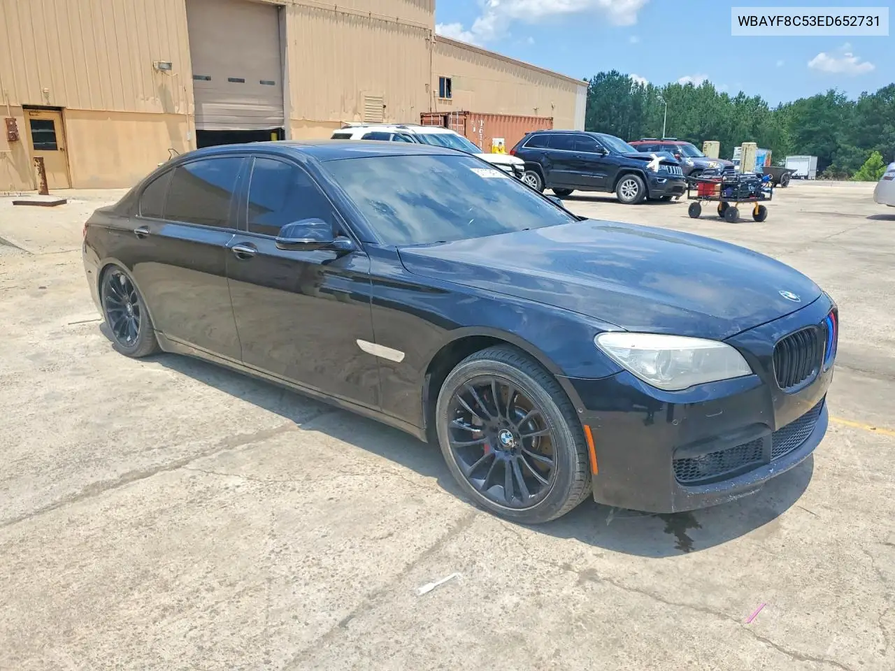 2014 BMW 750 Lxi VIN: WBAYF8C53ED652731 Lot: 57179476