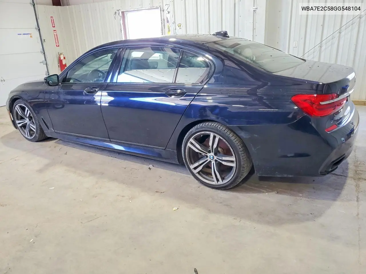 2016 BMW 740 I VIN: WBA7E2C58GG548104 Lot: 58695686