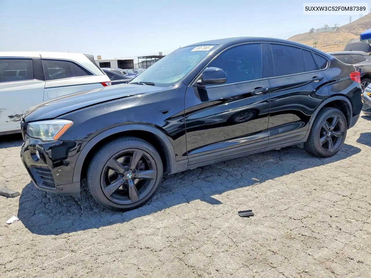 2015 BMW X4 xDrive28I VIN: 5UXXW3C52F0M87389 Lot: 55867666