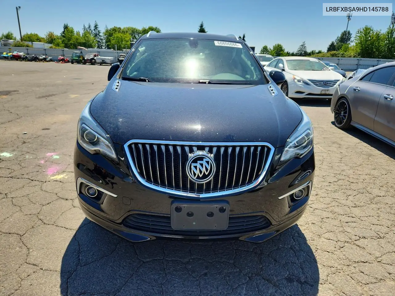 2017 Buick Envision Essence VIN: LRBFXBSA9HD145788 Lot: 60806086