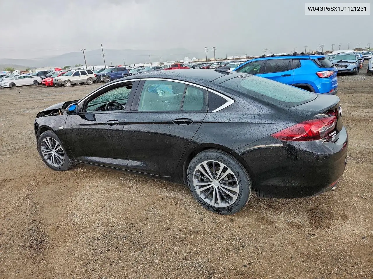 2018 Buick Regal Essence VIN: W04GP6SX1J1121231 Lot: 59714626