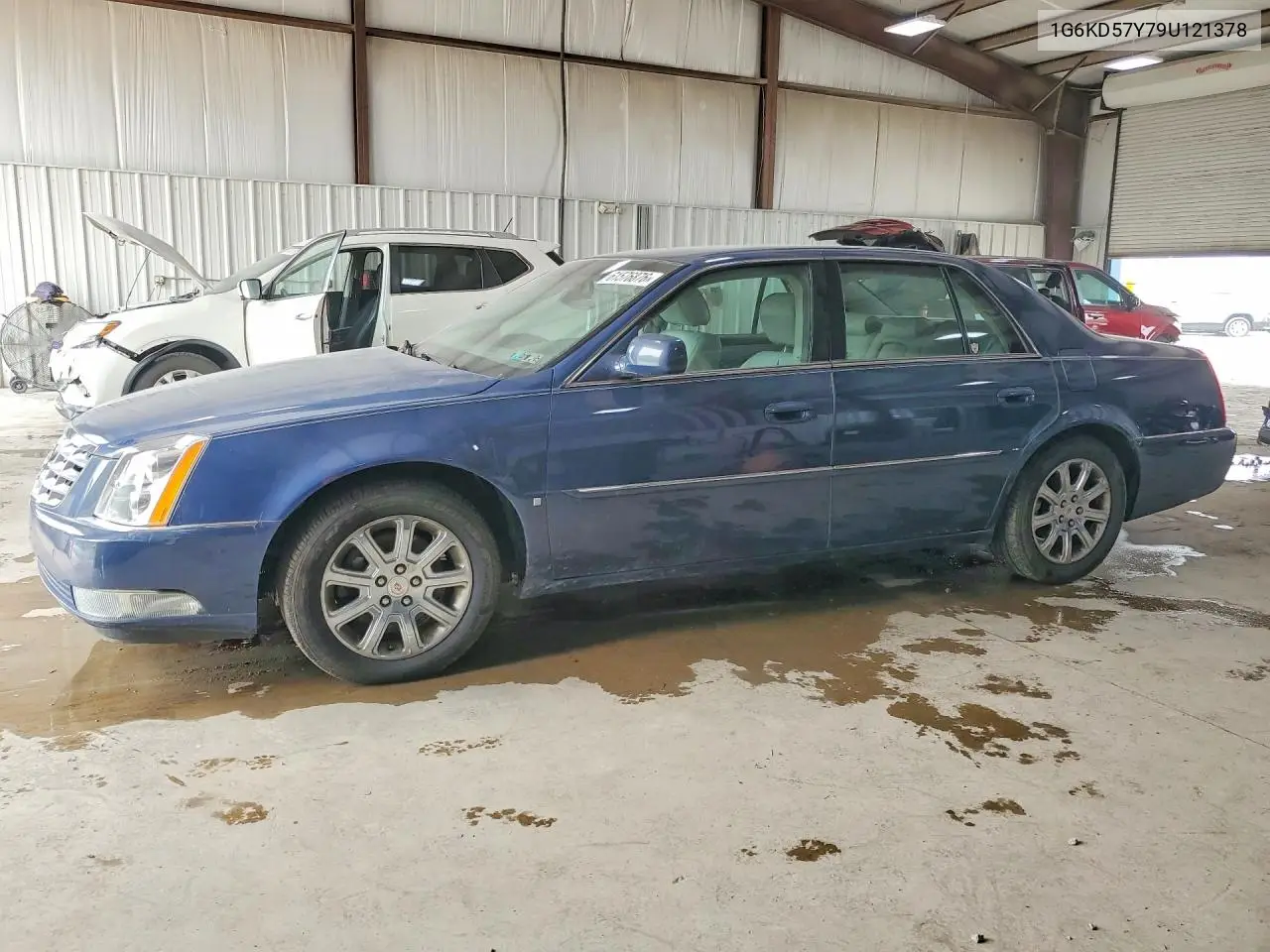 2009 Cadillac Dts VIN: 1G6KD57Y79U121378 Lot: 61576876