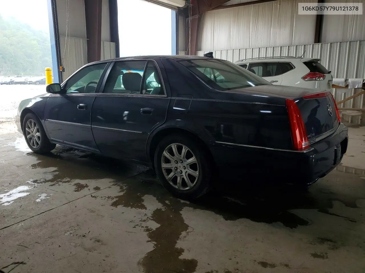 2009 Cadillac Dts VIN: 1G6KD57Y79U121378 Lot: 61576876