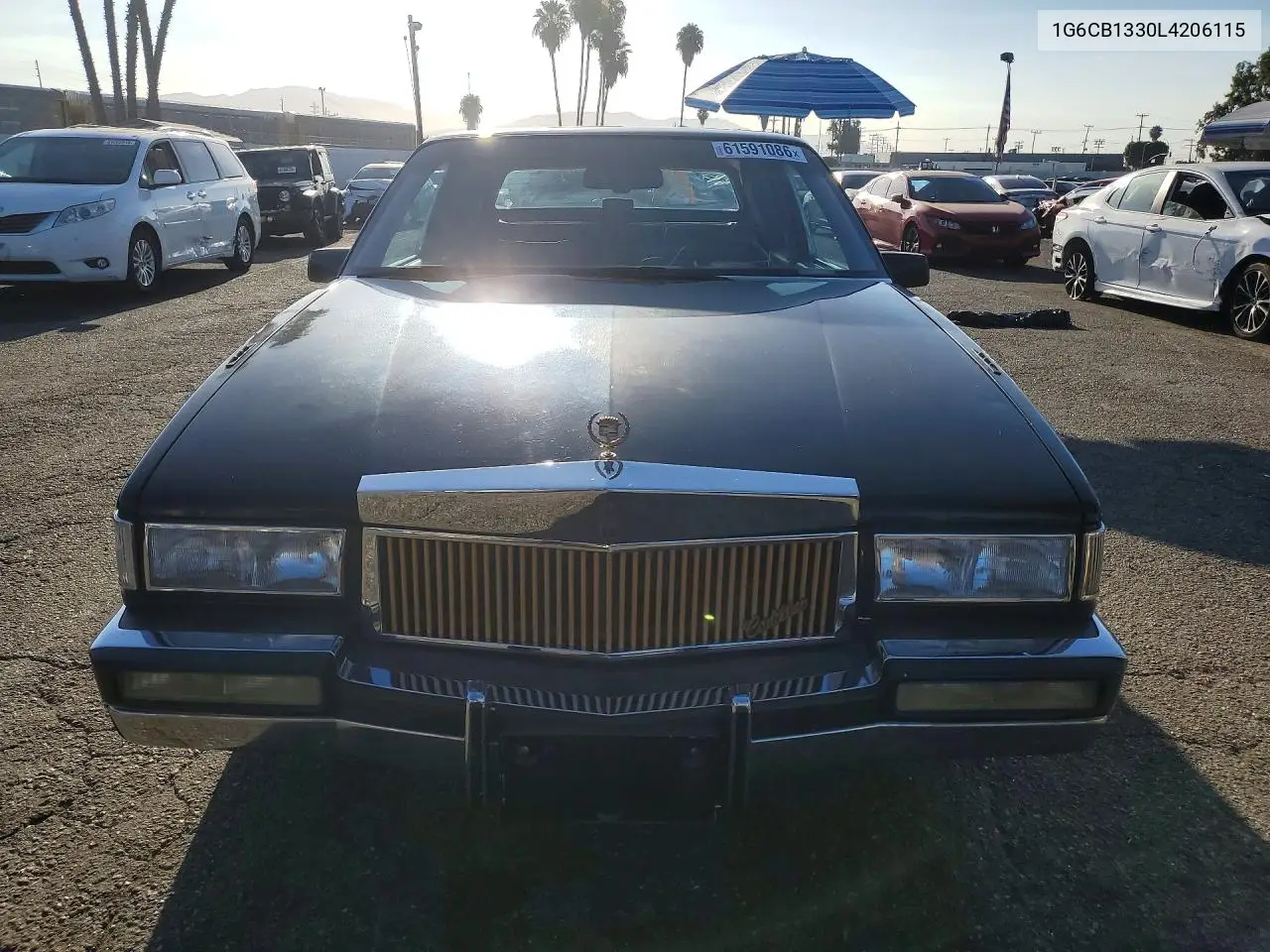 1990 Cadillac Fleetwood VIN: 1G6CB1330L4206115 Lot: 61591086