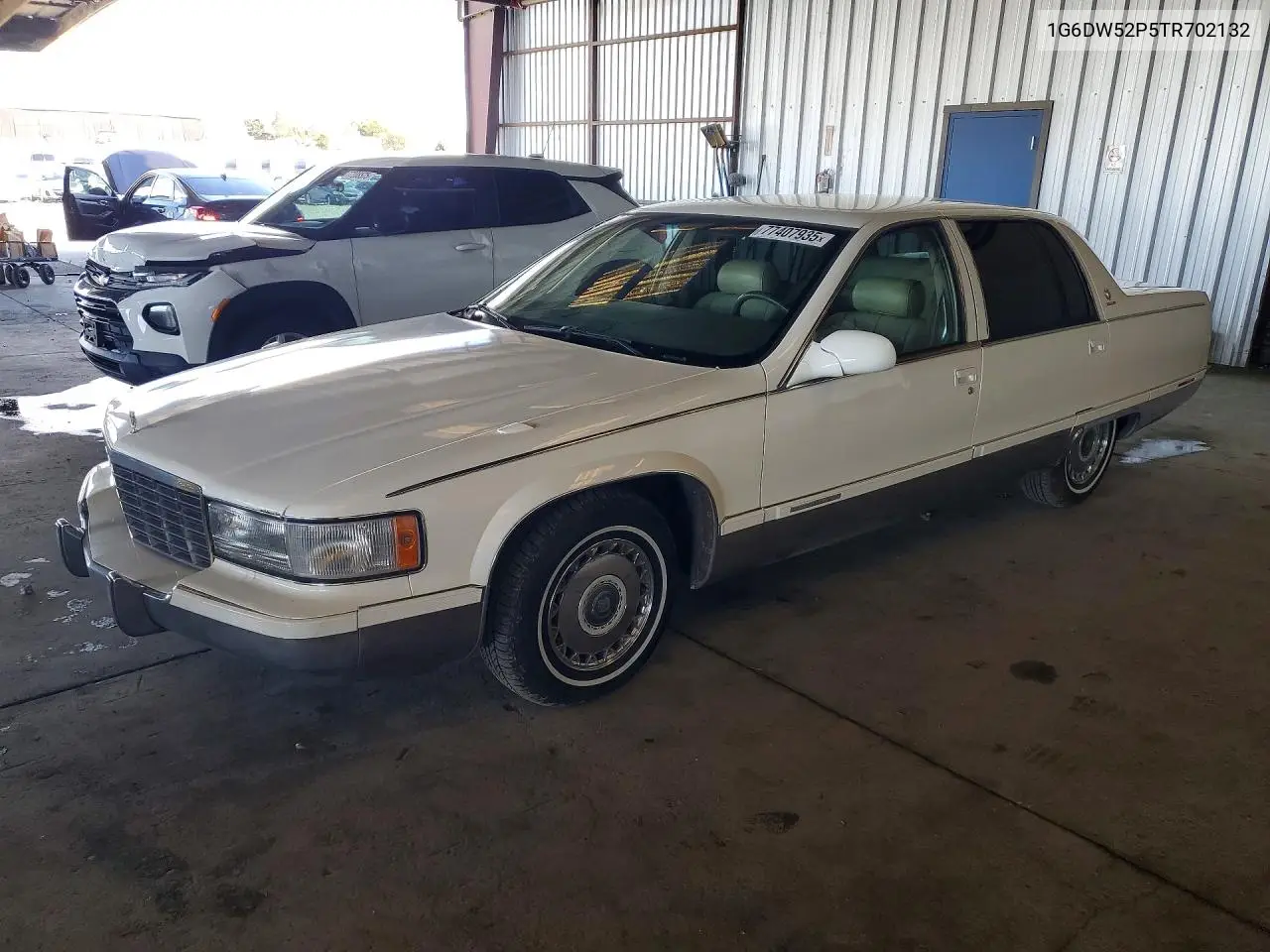 1996 Cadillac Fleetwood Base VIN: 1G6DW52P5TR702132 Lot: 77407935