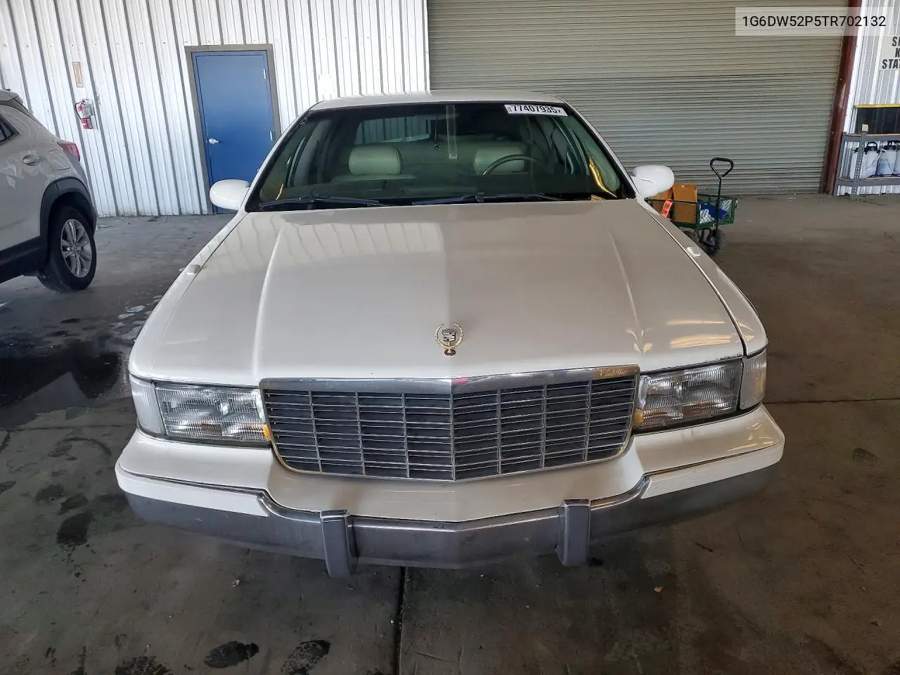 1996 Cadillac Fleetwood Base VIN: 1G6DW52P5TR702132 Lot: 77407935