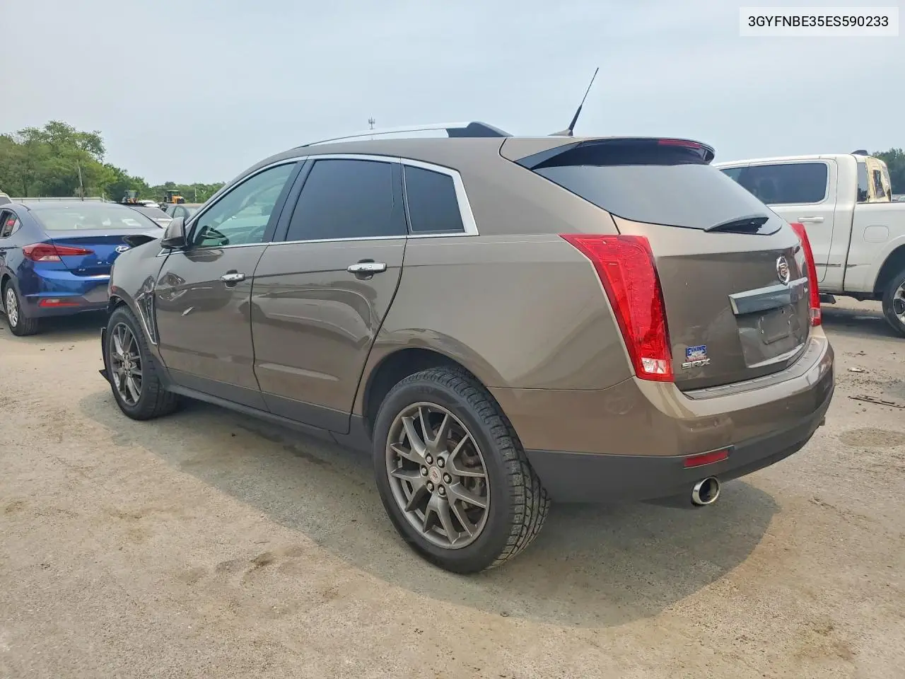 2014 Cadillac Srx Luxury Collection VIN: 3GYFNBE35ES590233 Lot: 61165686