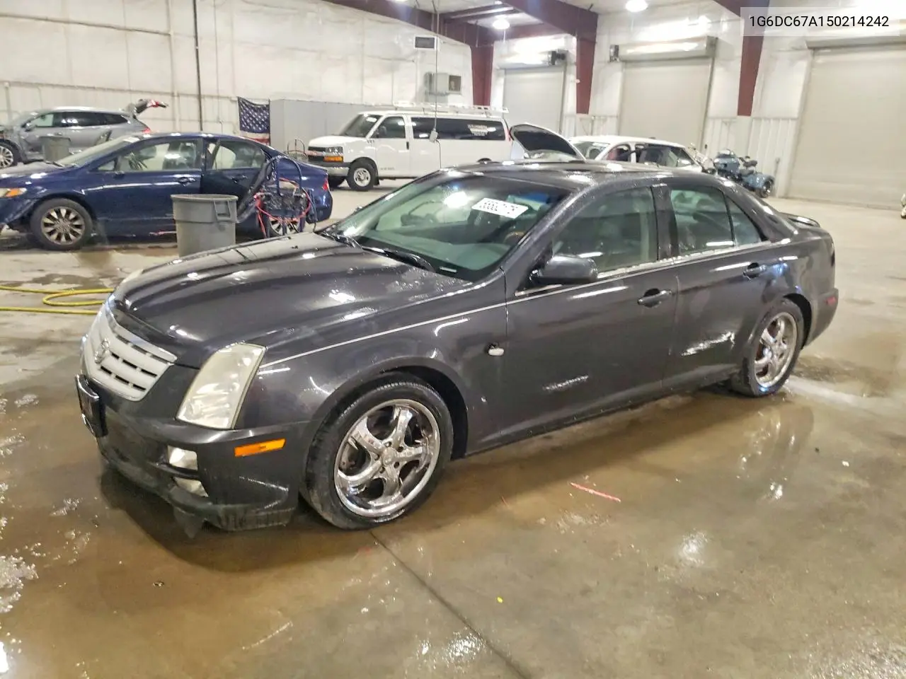 2005 Cadillac Sts VIN: 1G6DC67A150214242 Lot: 55532176