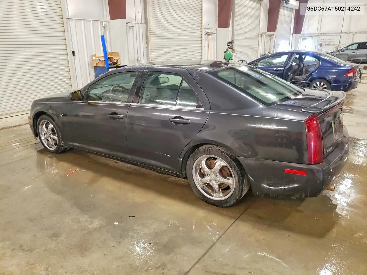 2005 Cadillac Sts VIN: 1G6DC67A150214242 Lot: 55532176