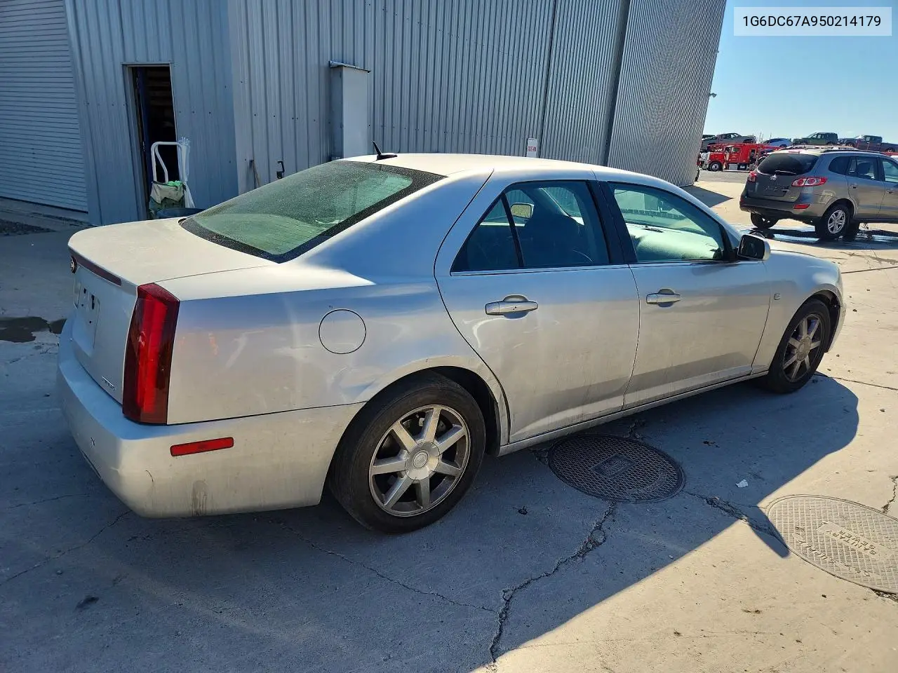 2005 Cadillac Sts VIN: 1G6DC67A950214179 Lot: 61893276