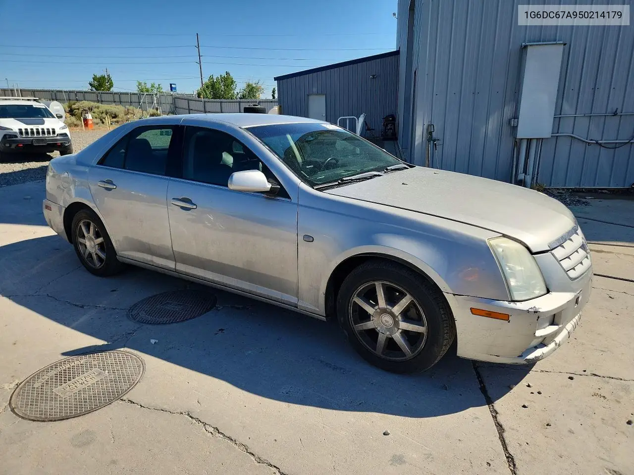 2005 Cadillac Sts VIN: 1G6DC67A950214179 Lot: 61893276