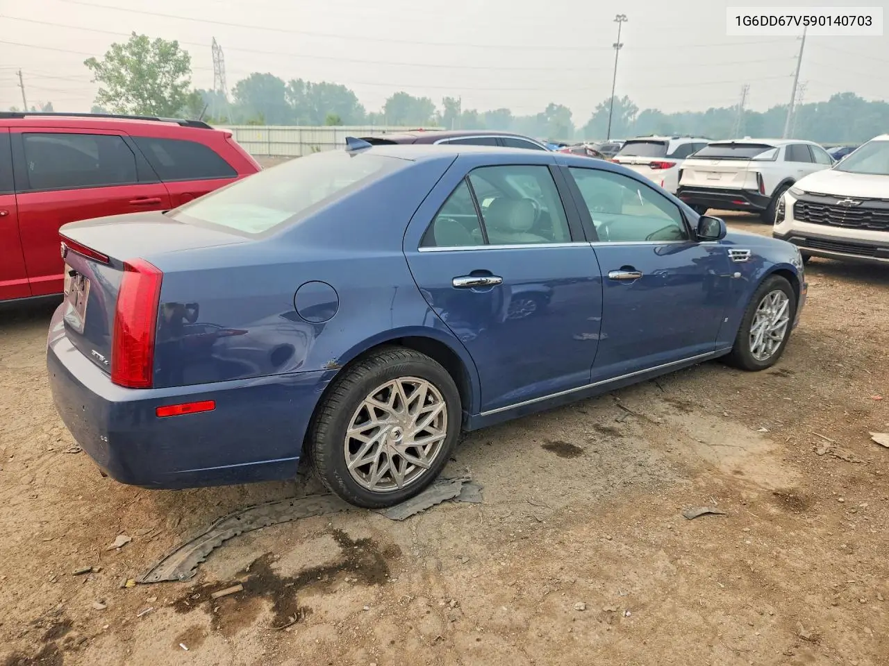 2009 Cadillac Sts VIN: 1G6DD67V590140703 Lot: 59079176