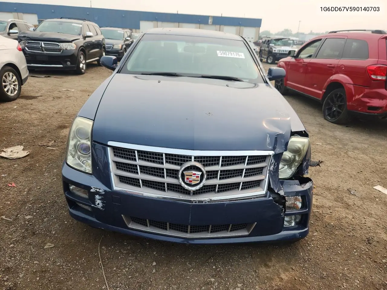 2009 Cadillac Sts VIN: 1G6DD67V590140703 Lot: 59079176