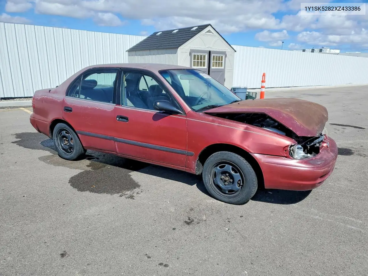 1999 Chevrolet Geo Prizm Base VIN: 1Y1SK5282XZ433386 Lot: 48695886