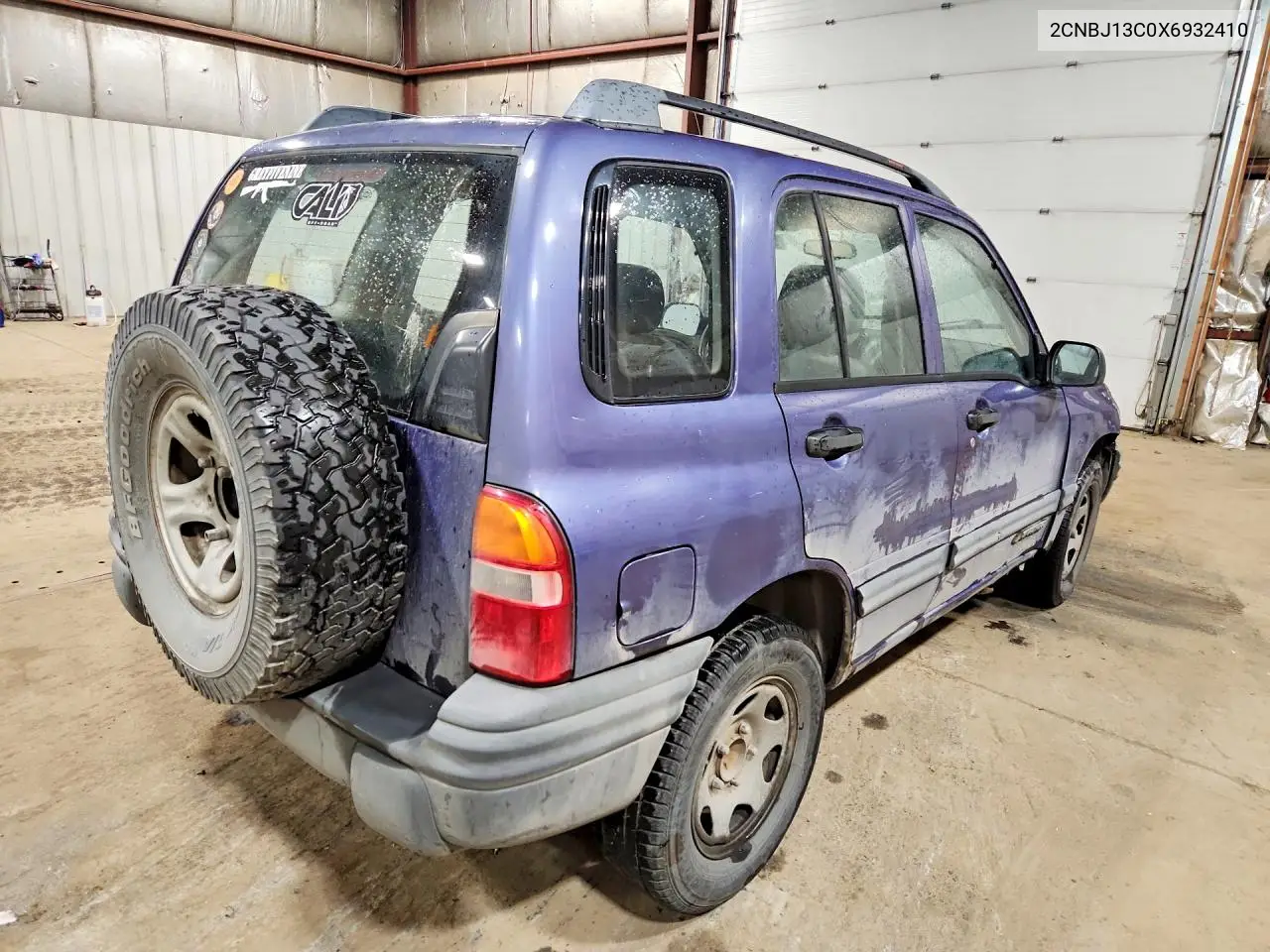 1999 Chevrolet Tracker VIN: 2CNBJ13C0X6932410 Lot: 58475236
