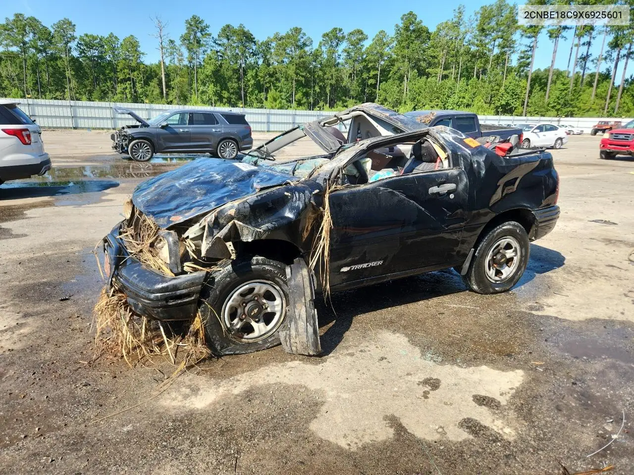 1999 Chevrolet Tracker VIN: 2CNBE18C9X6925601 Lot: 65270055