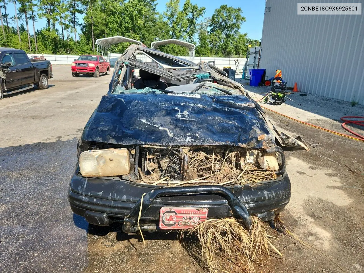 1999 Chevrolet Tracker VIN: 2CNBE18C9X6925601 Lot: 65270055