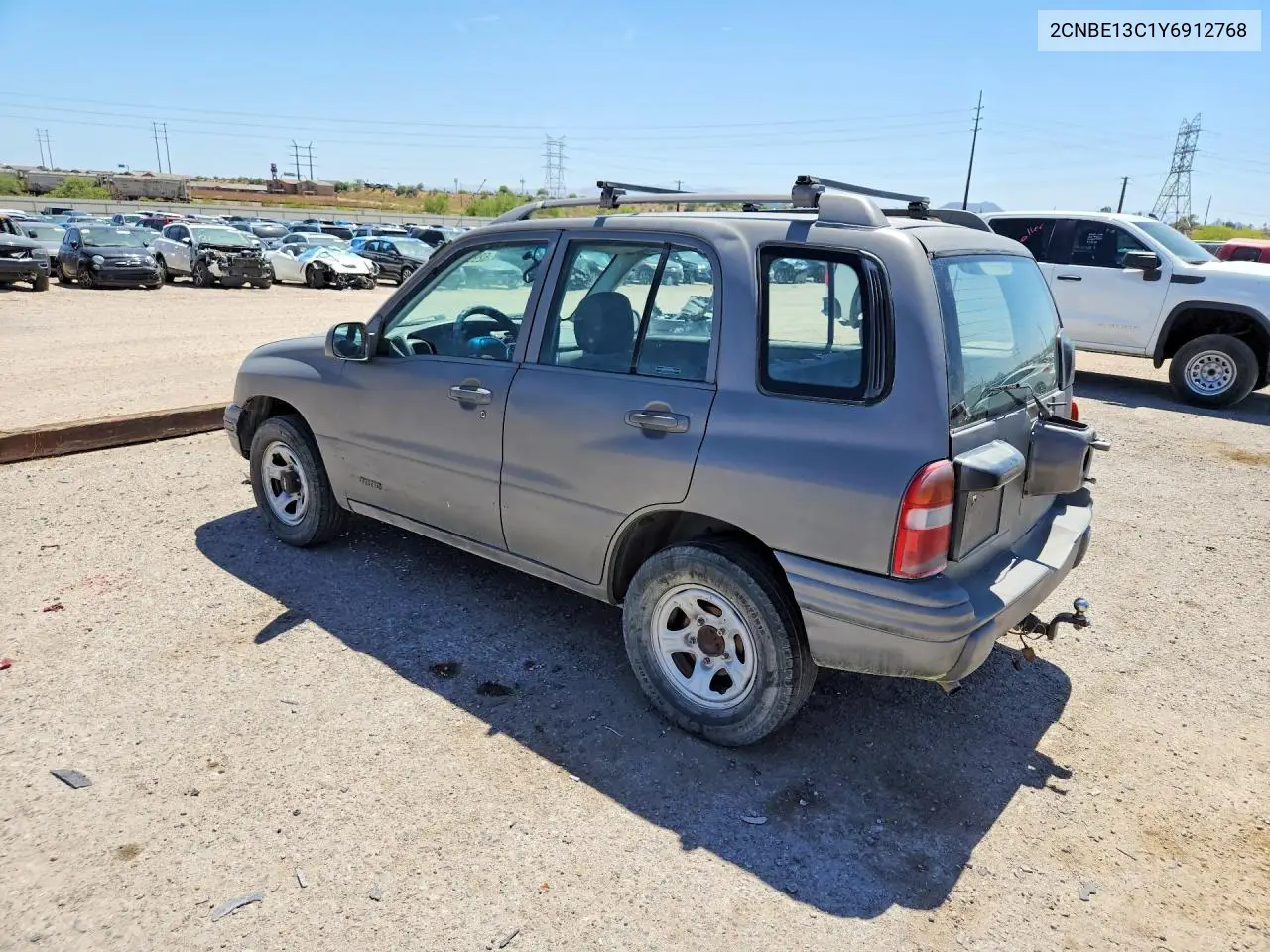 2000 Chevrolet Tracker VIN: 2CNBE13C1Y6912768 Lot: 52955486