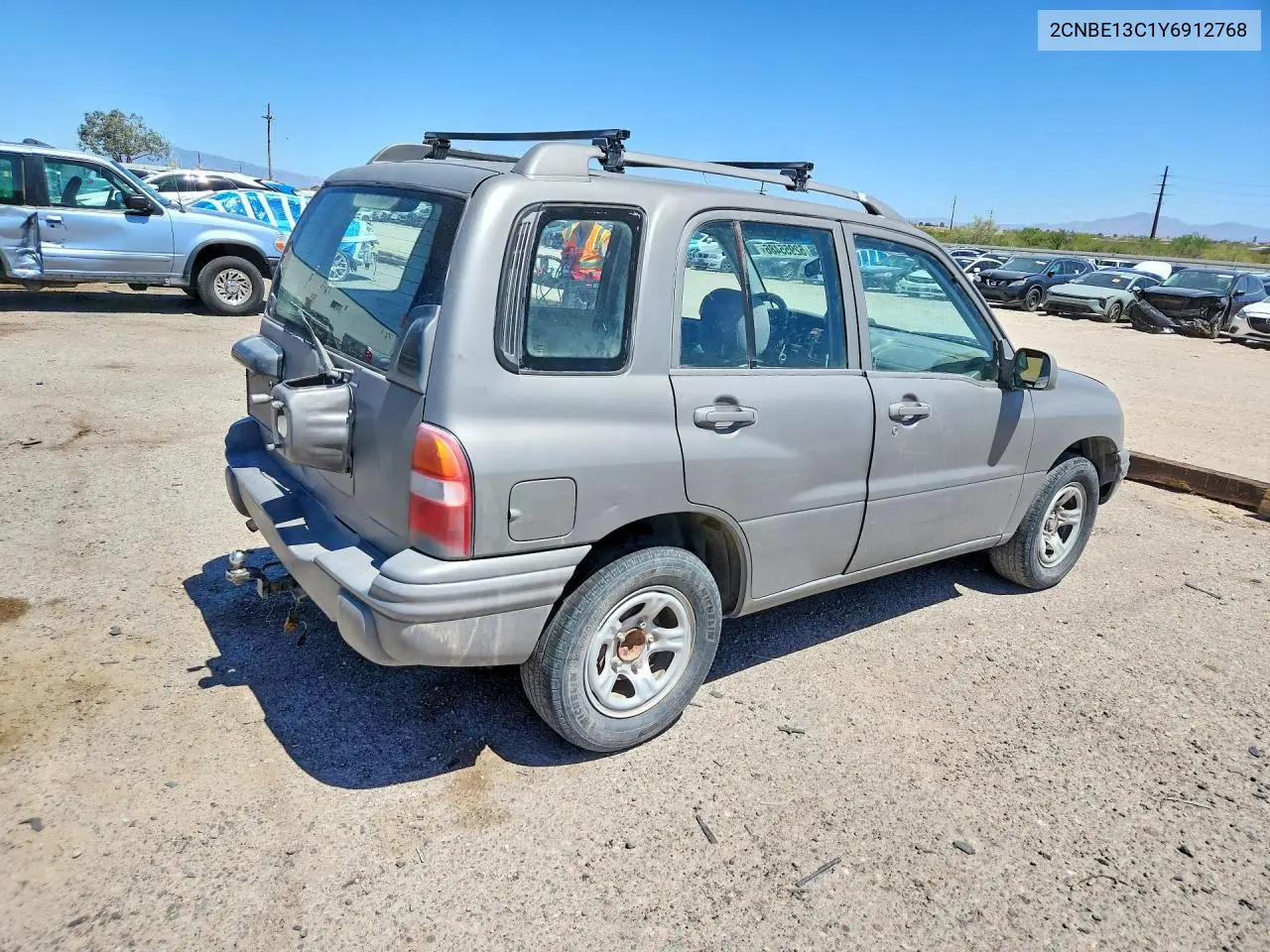 2000 Chevrolet Tracker VIN: 2CNBE13C1Y6912768 Lot: 52955486