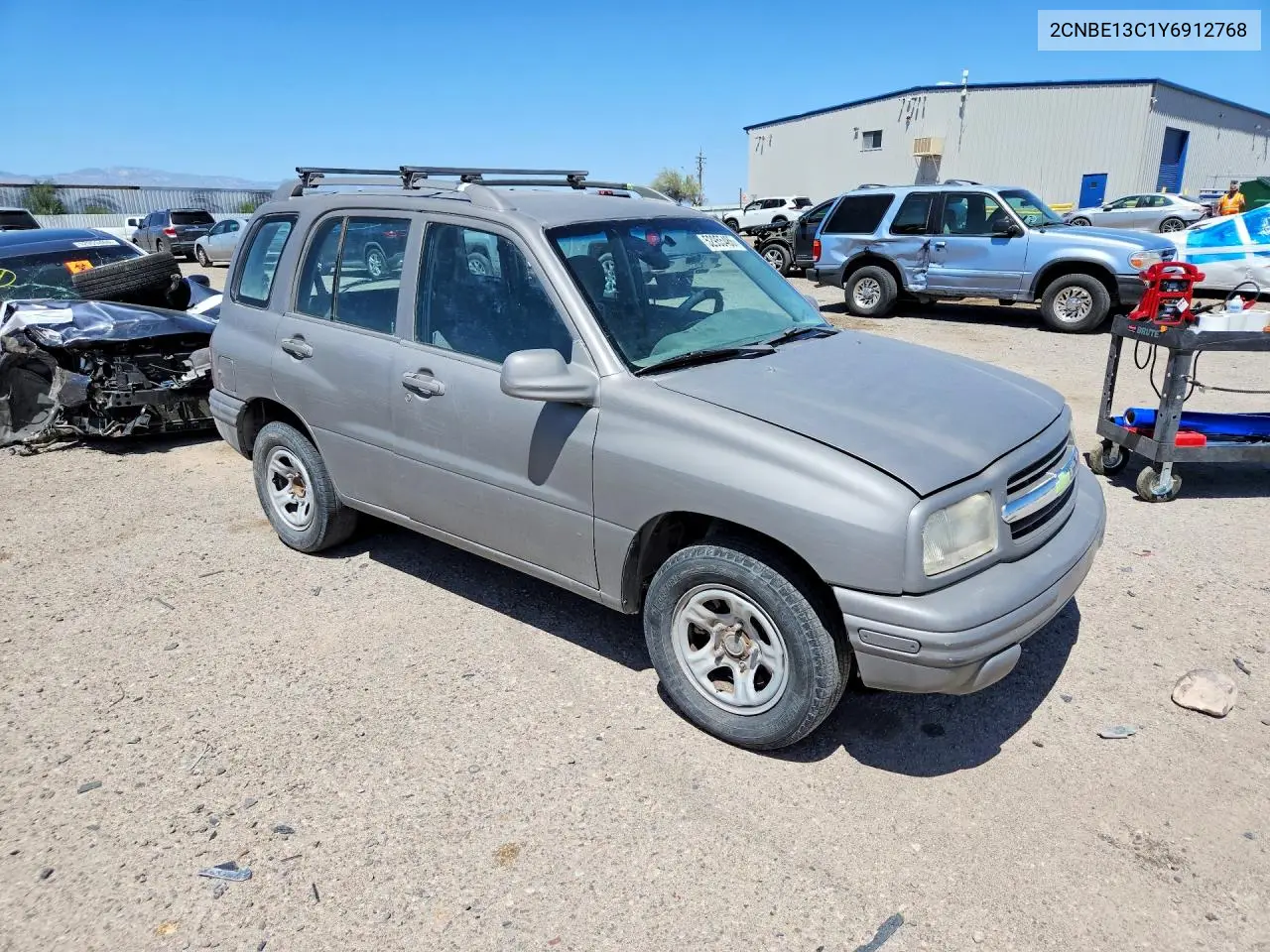 2000 Chevrolet Tracker VIN: 2CNBE13C1Y6912768 Lot: 52955486