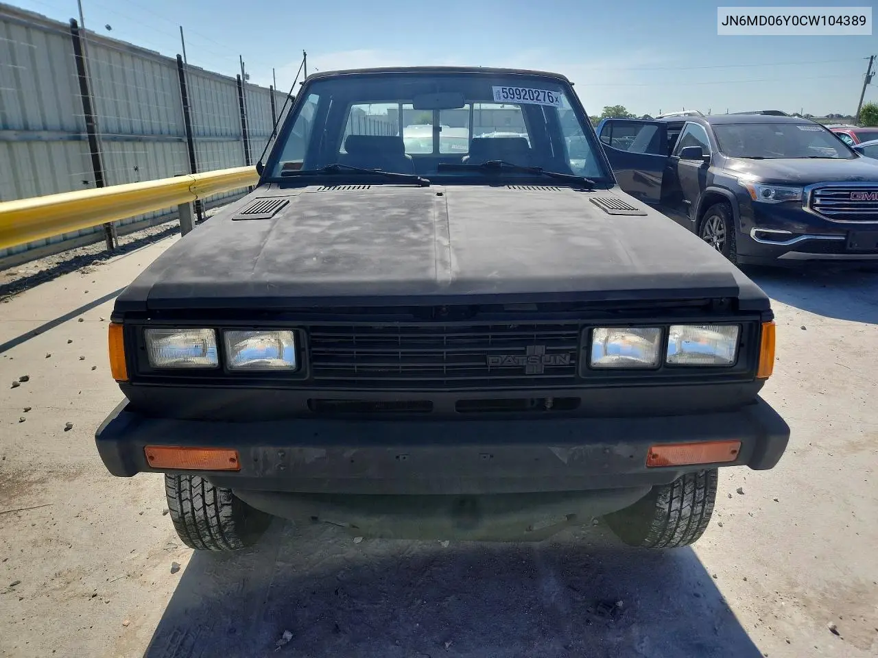 1982 Datsun 720 King Cab VIN: JN6MD06Y0CW104389 Lot: 59920276