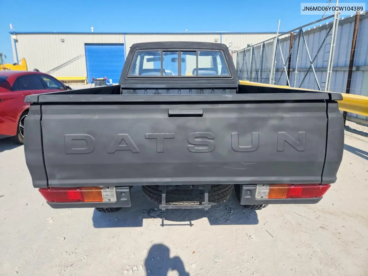 1982 Datsun 720 King Cab VIN: JN6MD06Y0CW104389 Lot: 59920276