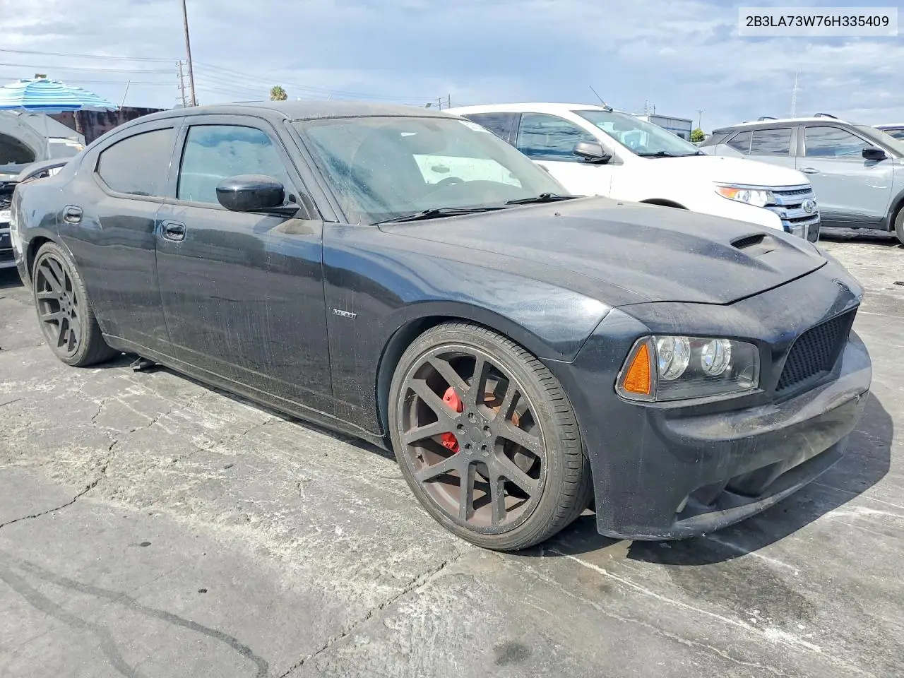 2006 Dodge Charger Srt-8 VIN: 2B3LA73W76H335409 Lot: 62065666