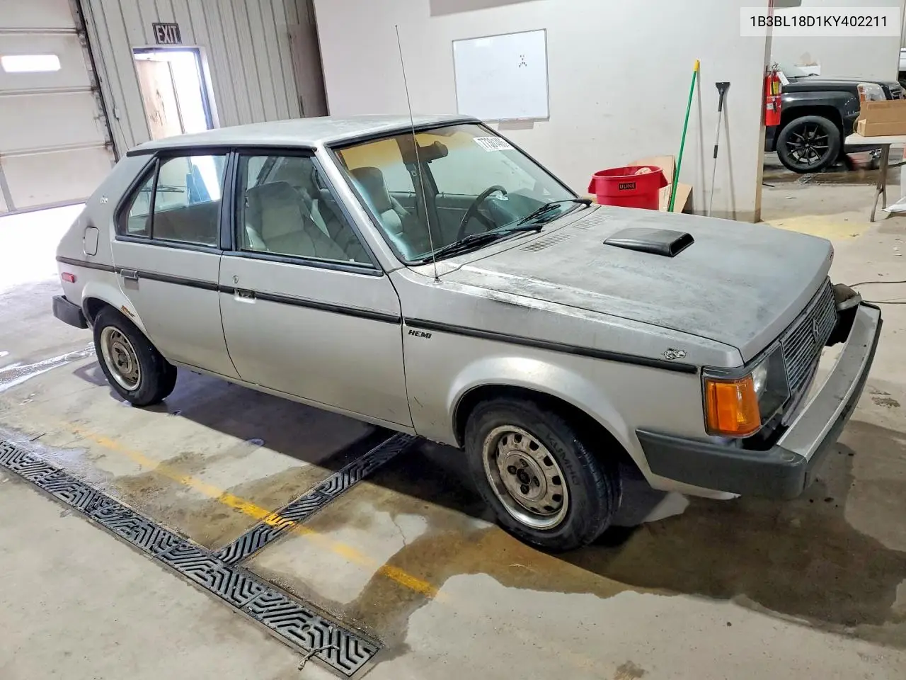 1989 Dodge Omni Expo VIN: 1B3BL18D1KY402211 Lot: 77301485