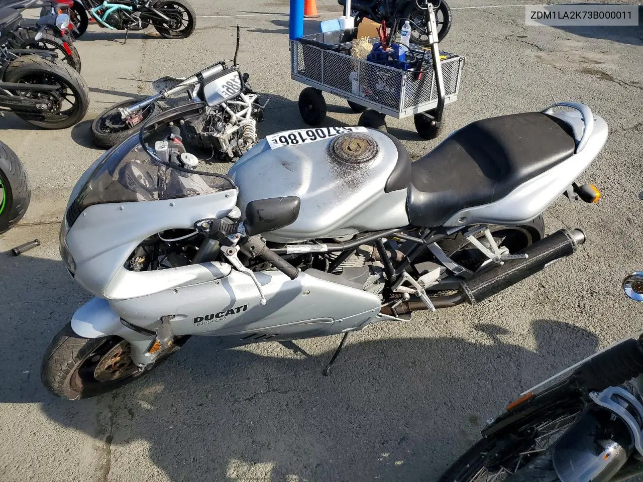 2003 Ducati 620 Sport VIN: ZDM1LA2K73B000011 Lot: 53706186