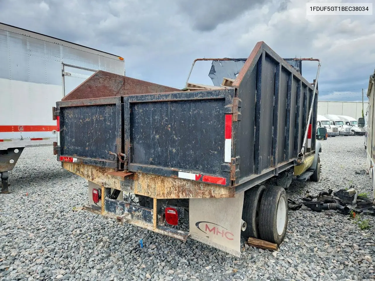 2011 Ford F550 Super Duty Dump Truck VIN: 1FDUF5GT1BEC38034 Lot: 57619086