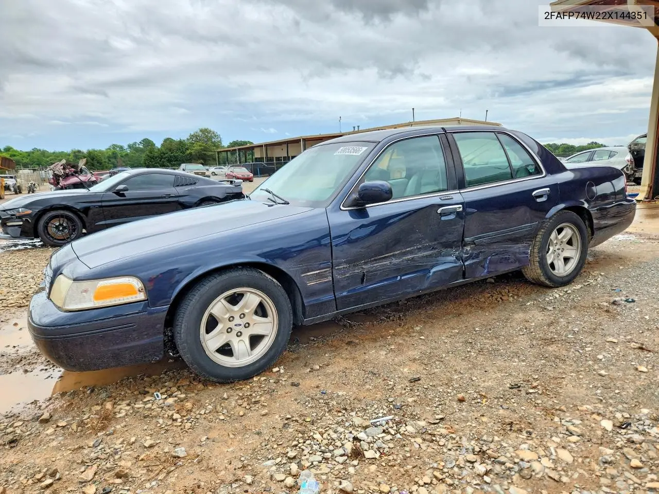 2002 Ford Crown Victoria Lx VIN: 2FAFP74W22X144351 Lot: 58053566