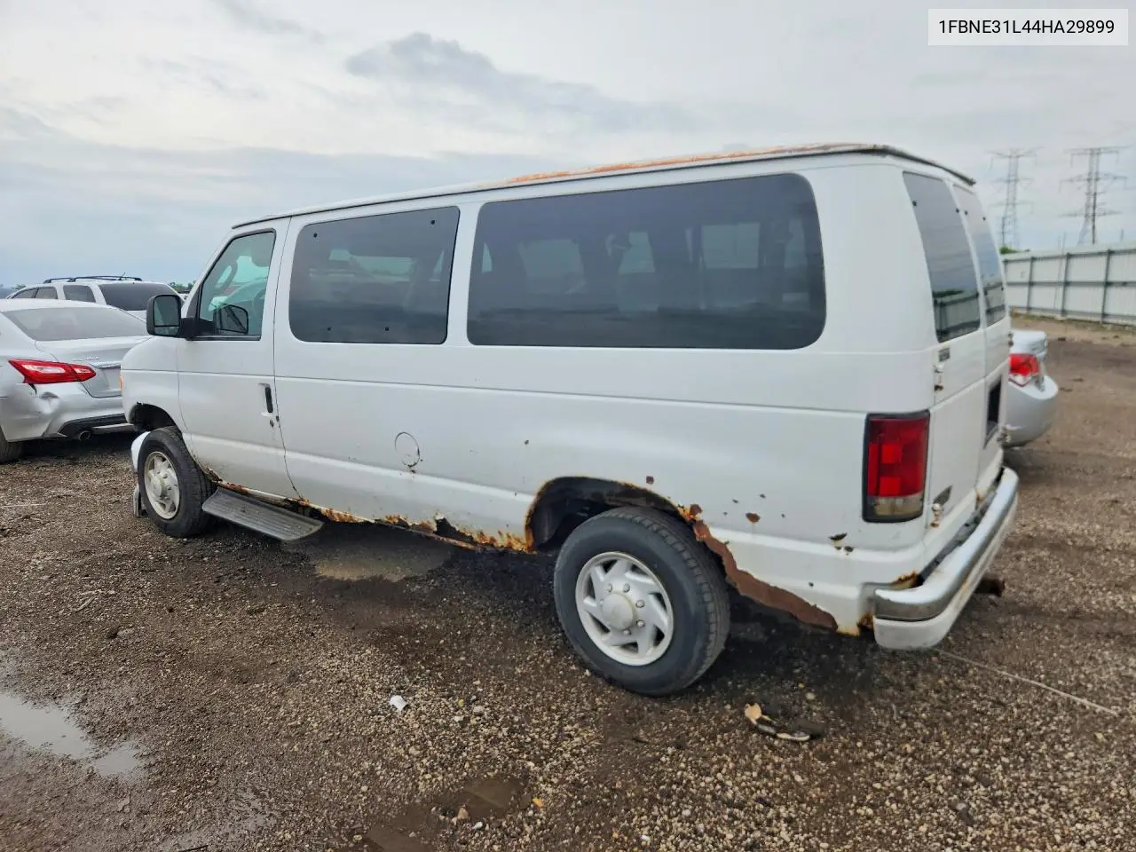 2004 Ford Econoline E350 Super Duty Wagon VIN: 1FBNE31L44HA29899 Lot: 55850596
