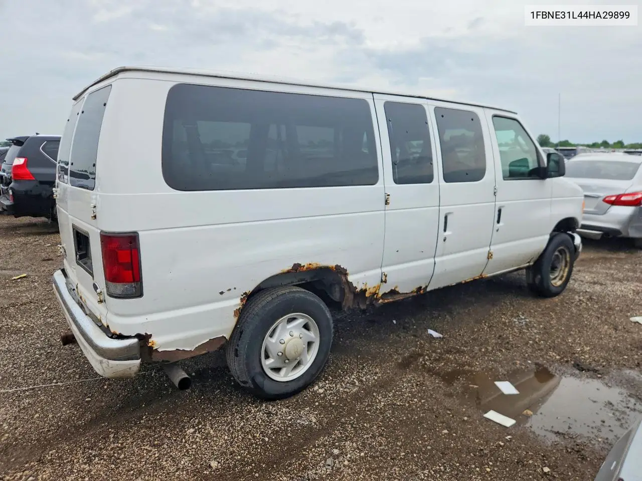 2004 Ford Econoline E350 Super Duty Wagon VIN: 1FBNE31L44HA29899 Lot: 55850596