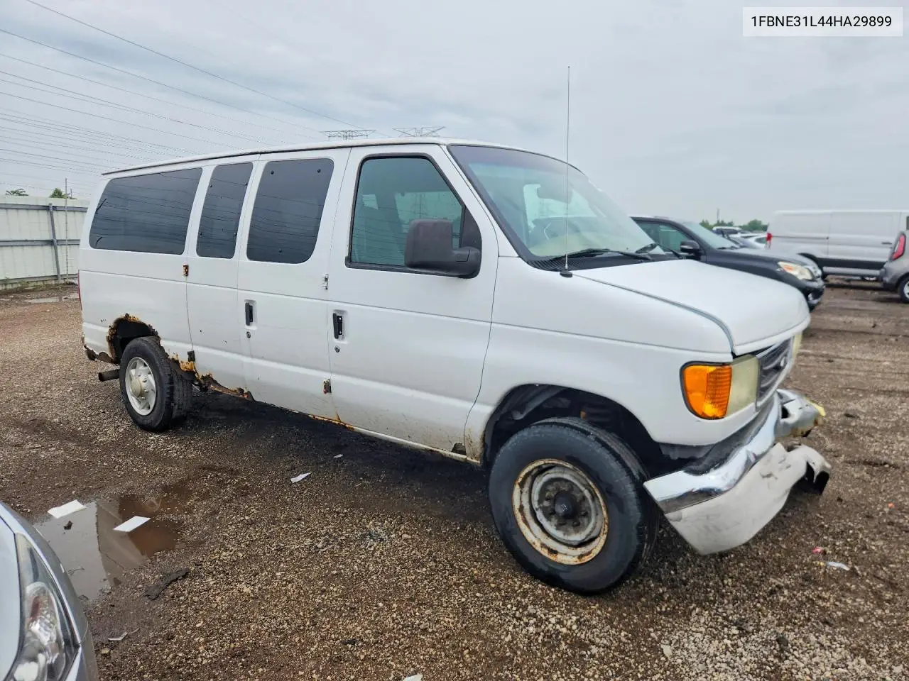 2004 Ford Econoline E350 Super Duty Wagon VIN: 1FBNE31L44HA29899 Lot: 55850596