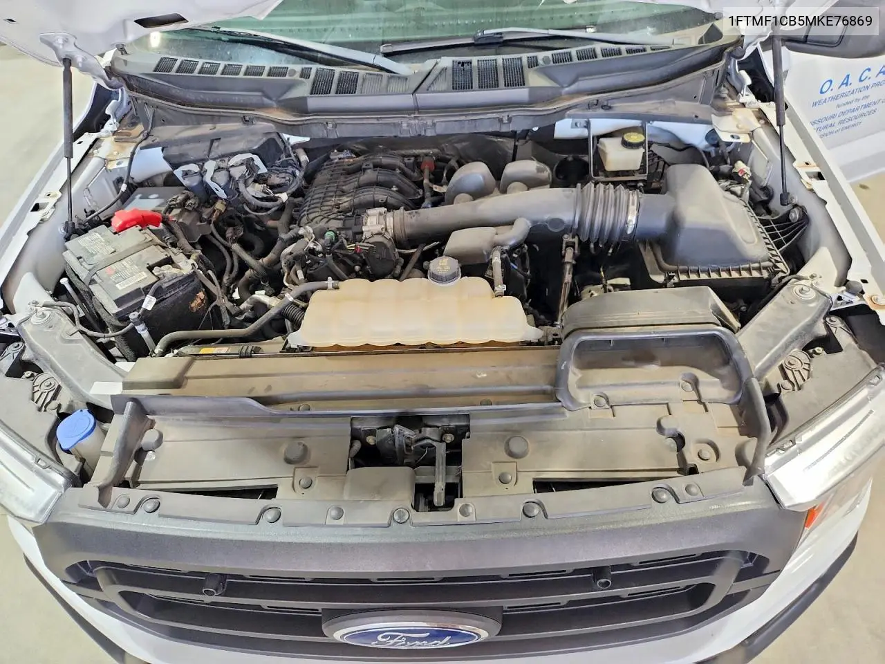 2021 Ford F150 VIN: 1FTMF1CB5MKE76869 Lot: 61985886