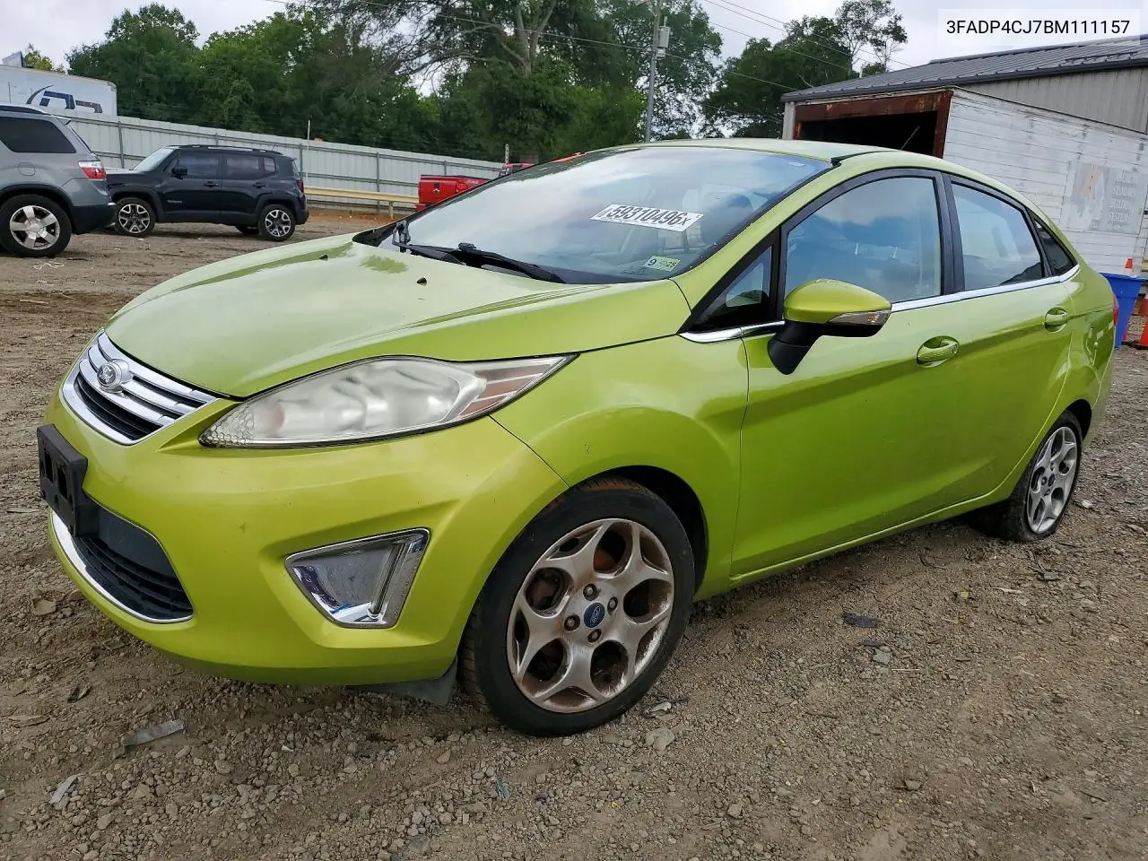 2011 Ford Fiesta VIN: 3FADP4CJ7BM111157 Lot: 59310496