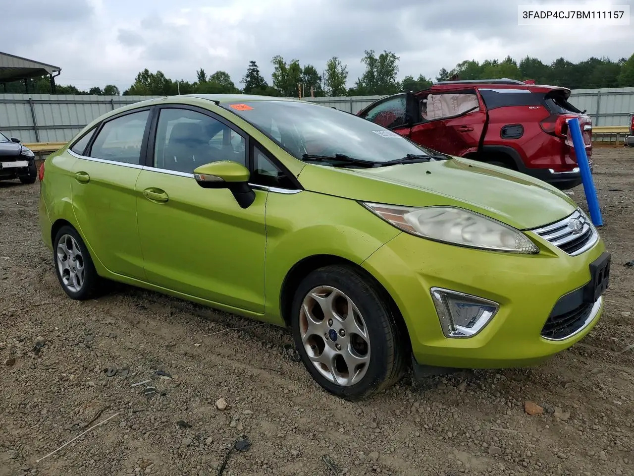 2011 Ford Fiesta VIN: 3FADP4CJ7BM111157 Lot: 59310496
