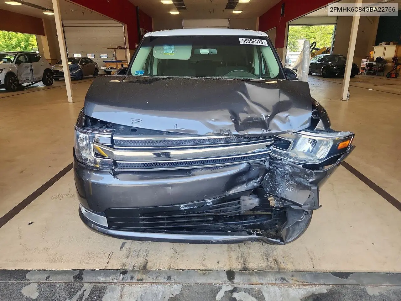 2016 Ford Flex VIN: 2FMHK6C84GBA22766 Lot: 59556016